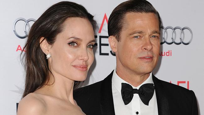 HOLLYWOOD, CA - NOVEMBER 05:  Angelina Jolie and Brad Pitt attend the premiere of "By the Sea" at the 2015 AFI Fest at TCL Chinese 6 Theatres on November 5, 2015 in Hollywood, California.  (Photo by Jason LaVeris/FilmMagic)