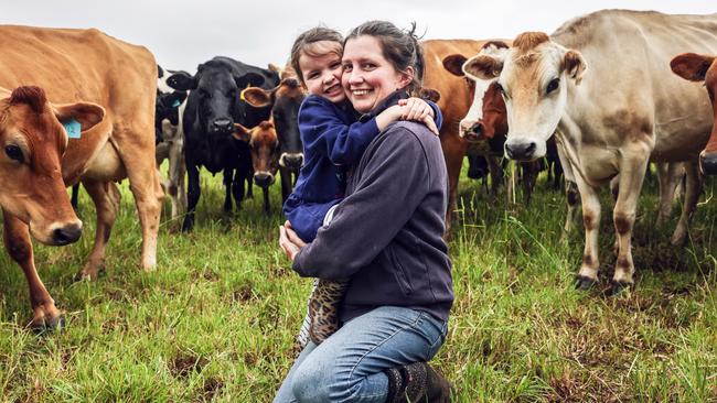 Southwest Victorian farmer Rachel McLean from Gorae, with some of their dairy cows, which are run on lease properties. Pictures: Nicole Cleary