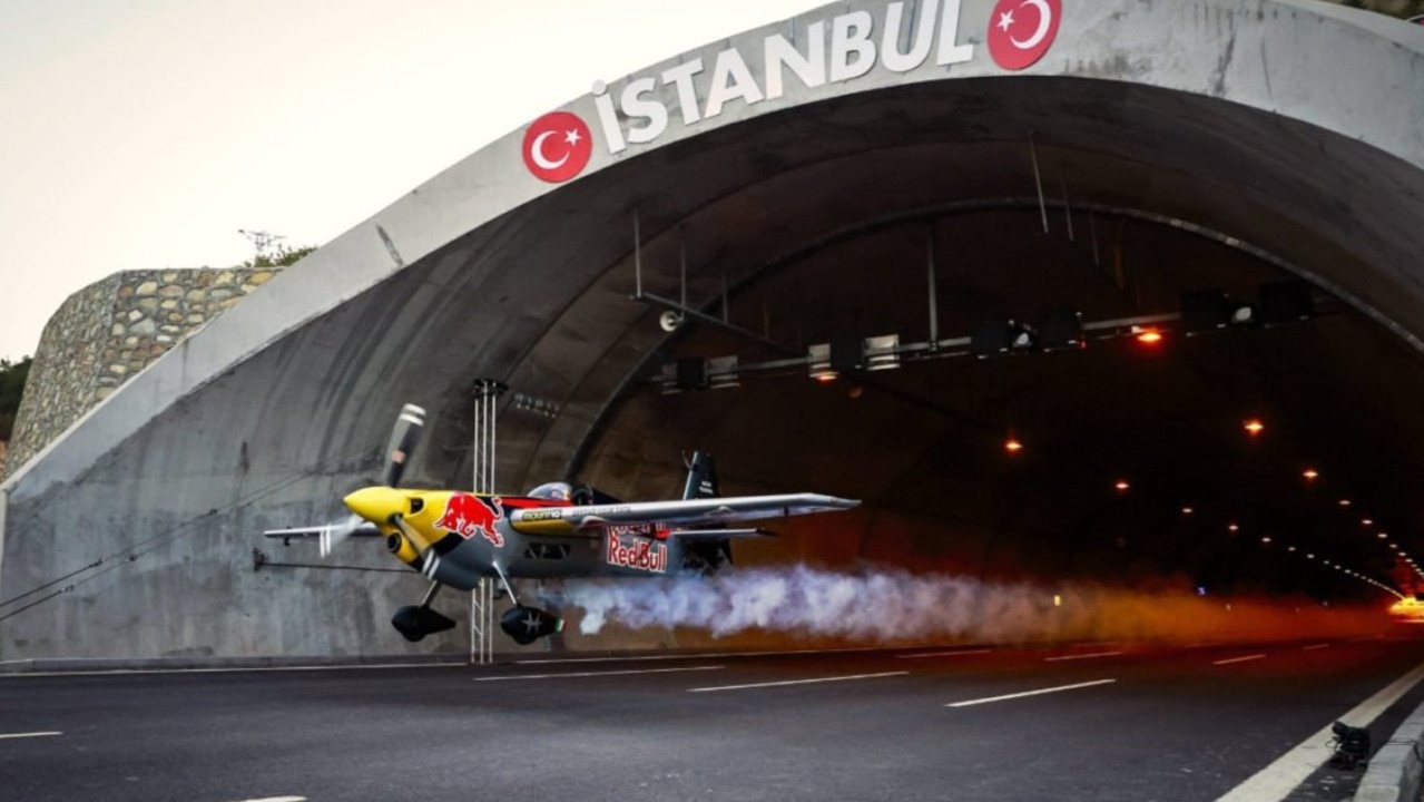 Italian race and stunt pilot Dario Costa emerges from one of the tunnels on his record setting flight in Turkey.