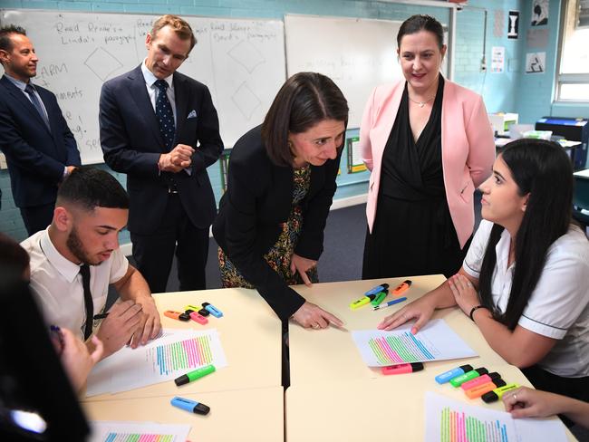 Premier Gladys Berejiklian with Holsworthy Melanie Gibbons MP and Education Minister Rob Stokes on Monday. (AAP Image/Dean Lewins)