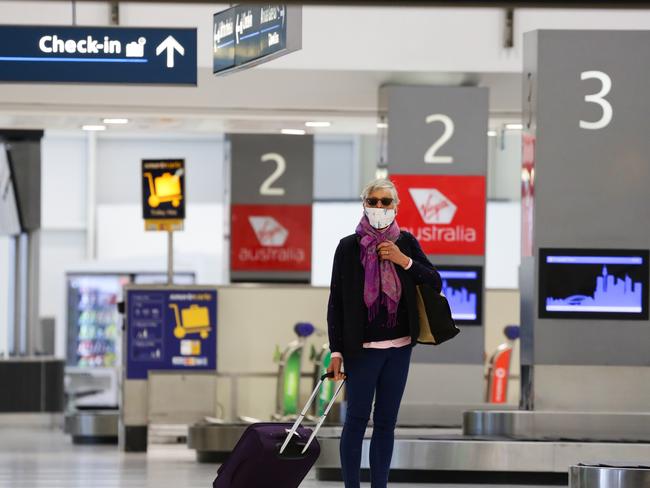 SYDNEY, AUSTRALIA - AUGUST 05 2020: Passengers arrive off JQ Flight from Melbourne in Sydney Domestic Airport in Sydney Australia on AUGUST 05 2020. Photo: NCA NewsWire / Gaye Gerard