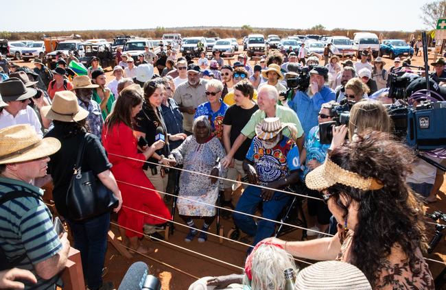 The Uluru family inundated at the climb’s closure. Picture: EMMA MURRAY