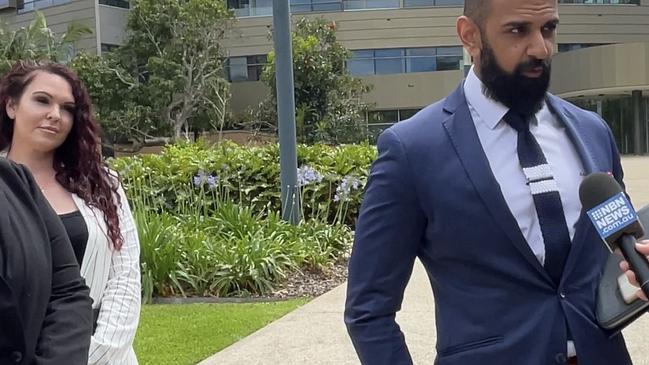 Influencer Sarah Mills and solicitor Samir Banga outside Coffs Harbour Local Court after charges against her were withdrawn this morning, November 10, 2022.