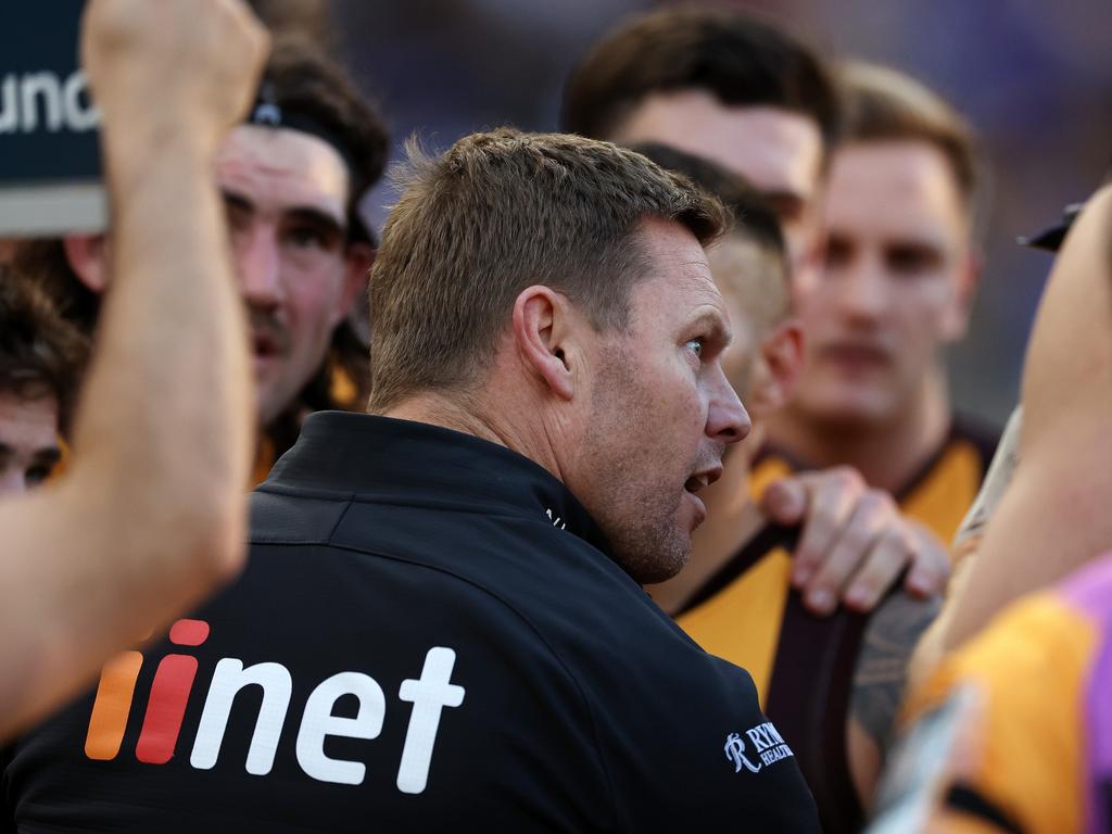 Sam Mitchel speaks to the Hawks at the three-quarter-time huddle. Picture: Will Russell/AFL Photos