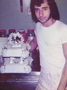 A young Joe Marchetta of Pasticceria Via Reggio with his first wedding cake. Picture: Supplied