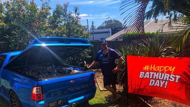 Joe Williams with his beloved blue ute filled with beer and ice for his annual Bathurst celebration.