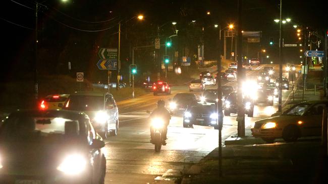 A constant flow of traffic throughout the night on Parramatta Road from Concord to Parramatta is possibly due to the cost of using the M4 Motorway. Photo: Bill Hearne