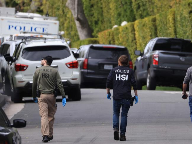 Homeland Security Investigations agents were seen outside the star’s home. Picture: David Swanson/AFP