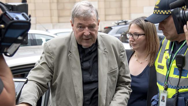 George Pell leaving the County Court in February last year. Picture: Andy Brownbill