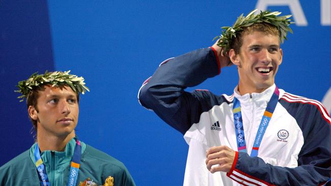 Ian Thorpe (L) next to Michael Phelps on the podium in Athens.