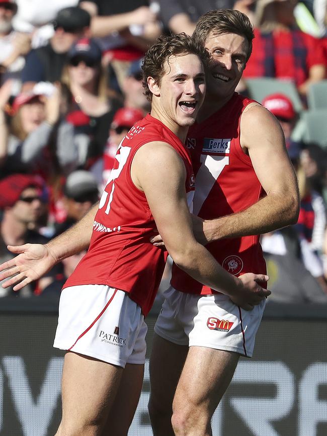 Boyd Woodcock celebrates one of his three grand final goals with Jarred Allmond. Picture Sarah Reed