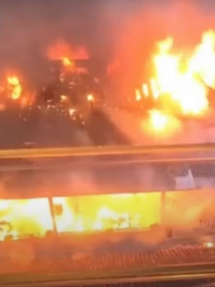 Flames engulfed two businesses in Bali on Saturday. Picture: 7NEWS