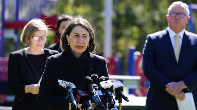 NSW Chief Health Officer Dr Kerry Chant, Premier Gladys Berejiklian and Health Minister Brad Hazzard in Sydney on Monday. Picture: Gaye Gerard