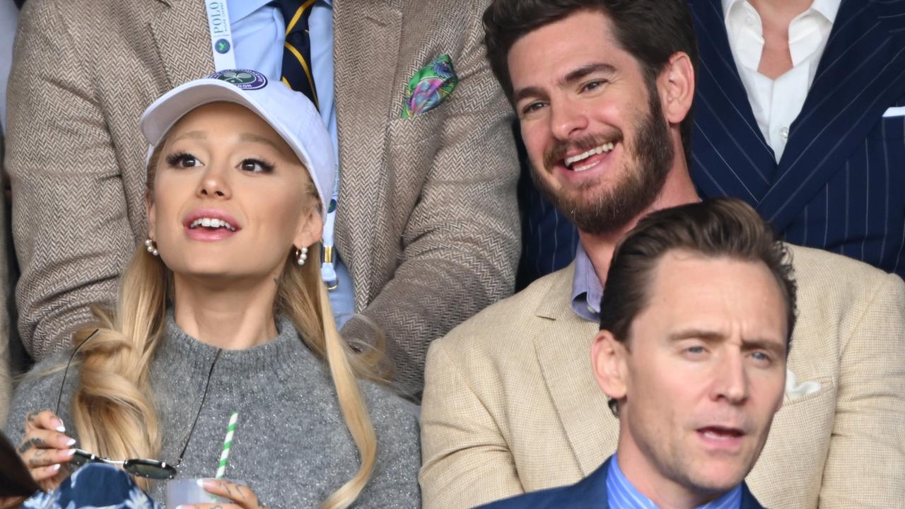 Ariana Grande rubbing shoulders with Andrew Garfield and Tom Hiddleston. Photo by Karwai Tang/WireImage.