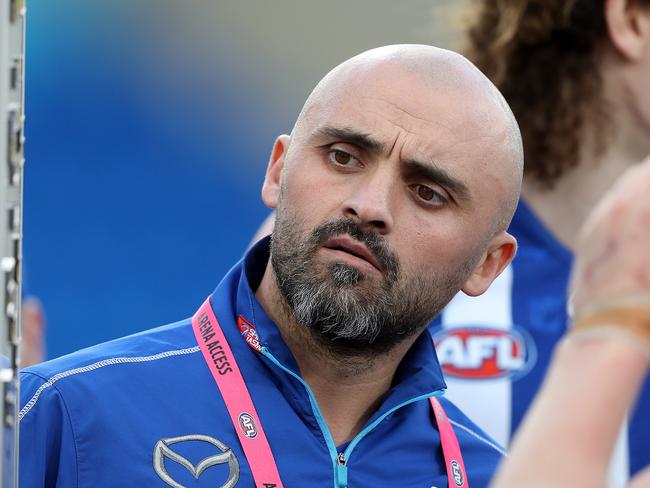 HOBART, AUSTRALIA - AUGUST 24: Kangaroos coach Rhyce Shaw speaks to his players at the break during the round 23 AFL match between the North Melbourne Kangaroos and the Melbourne Demons at Blundstone Arena on August 24, 2019 in Hobart, Australia. (Photo by Robert Cianflone/Getty Images)