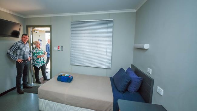 Chief Minister Michael Gunner and Deputy Chief Health Officer Dianne Stephens inspect a single person’s room at a press conference at the Howard Springs quarantine facility, as the NT borders are reopened to interstate visitors. Picture: Glenn Campbell