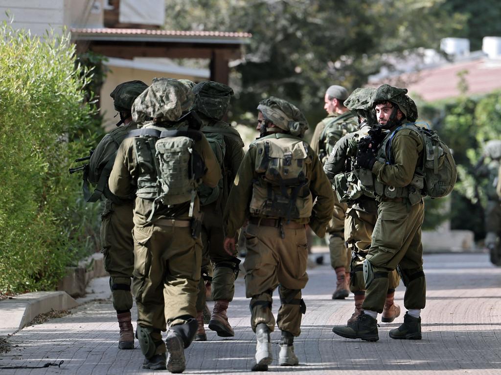 Israeli soldiers patrol Kibbutz Be'eri along the border with the Gaza Strip. Picture: AFP