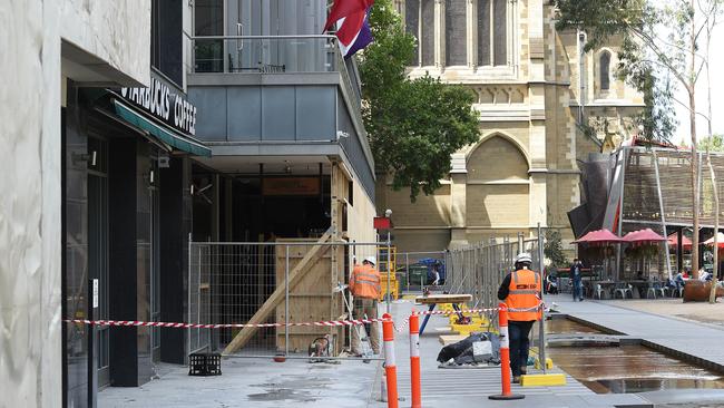 Shops are boarded up in Melbourne City Square last month in preparation for the new metro train station. Picture: Josie Hayden