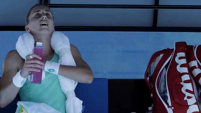 Croatia's Petra Martic takes a drink during a break in her third round match against Thailand's Luksika Kumkhum. Photo: AP