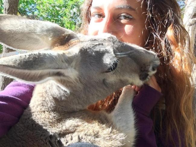 Lucia Rodriguez cuddles up to a kangaroo. Picture: Instagram