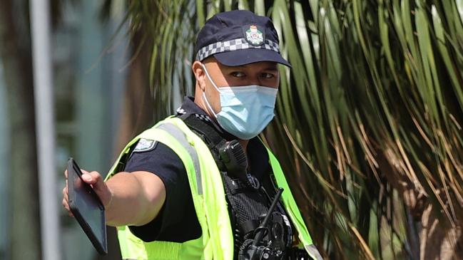 Police at the Queensland border in Griffith Street, Coolangatta. Picture: NIGEL HALLETT