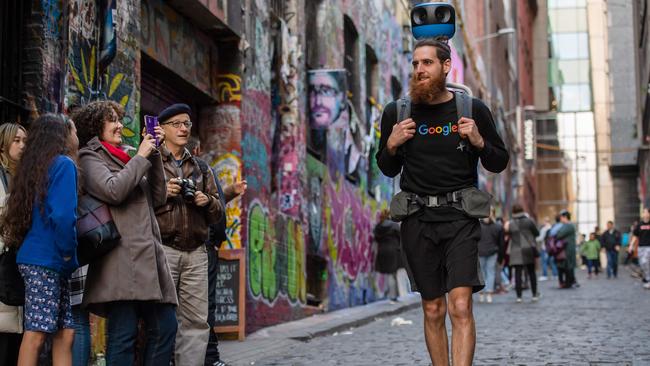 Camera operator Matt with the "Trekker" Google's street view camera, taking in Melbourne’s iconic laneways. Picture: Jason Edwards