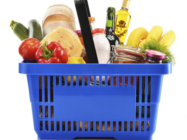 Shopping basket with variety of grocery products isolated on white. Generic from Thinkstock