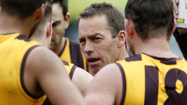 Alastair Clarkson talks to his players during a game at the MCG. Picture: Wayne Ludbey