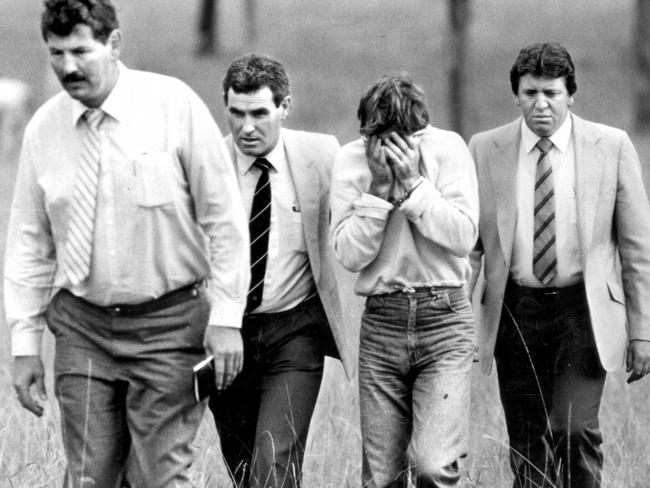 Michael Murphy with detectives at Prospect paddock re-enacting the rape and murder of Anita Cobby.