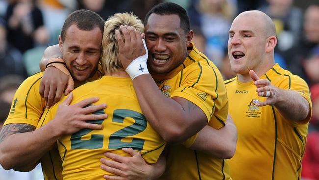 Quade Cooper and Sekope Kepu give a hug to the answer to Q7.