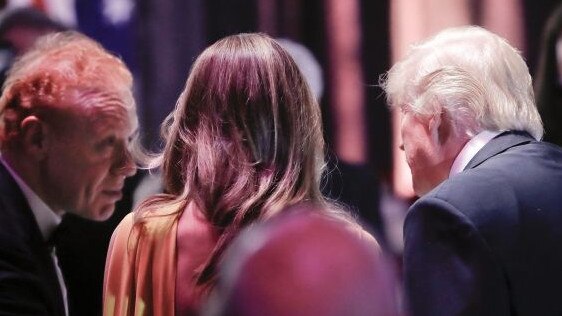 US president Donald Trump and his wife Melania speaking to Anthony Pratt.