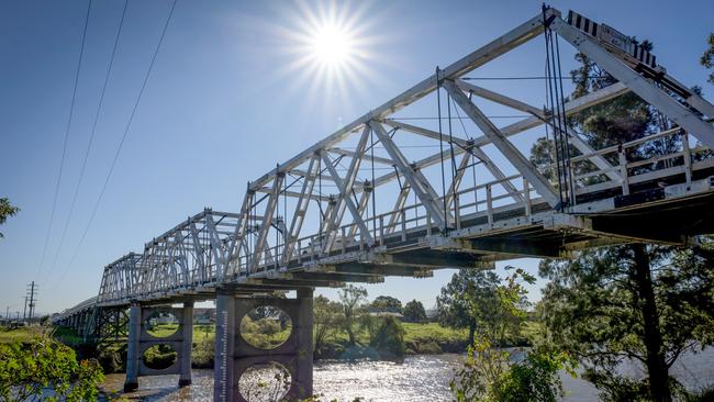 The heritage-listed Morpeth Bridge spans the Hunter River. Picture: Destination NSW