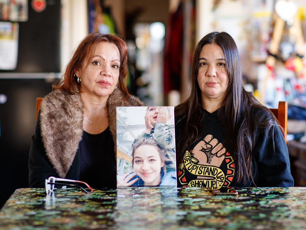 Grandmother Mandy Brown and mother Courtney Hunter-Hebberman hold a photograph of Rose. Picture: Matt Turner