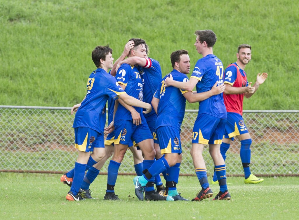 USQ celebrate a goal. Football, Willowburn vs USQ. Sunday, 4th Mar, 2018. Picture: Nev Madsen