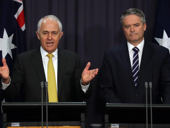 The Prime Minister Malcolm Turnbull with Senator Mathias Cormann, Acting Special Minister of State, during a press conference in parliament House in Canberra. Picture Gary Ramage