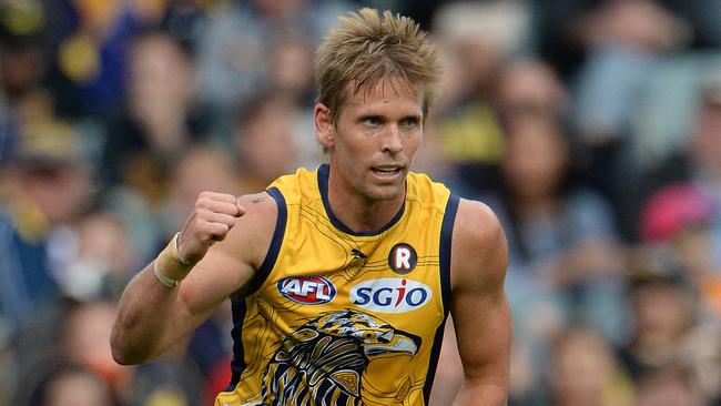 West Coast's Mark LeCras celebrates a goal in the third term.