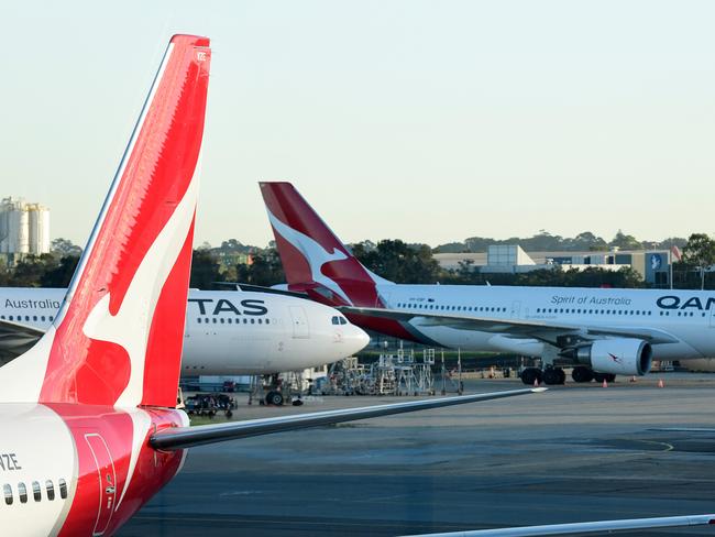 Qantas aircraft are seen on the tarmac at Sydney Airport, Adelaide, Wednesday, May 8, 2019. (AAP Image/Bianca De Marchi) NO ARCHIVING