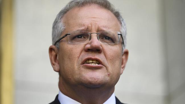 Australian Prime Minister Scott Morrison said schools will remain open for now. (AAP Image/Lukas Coch)