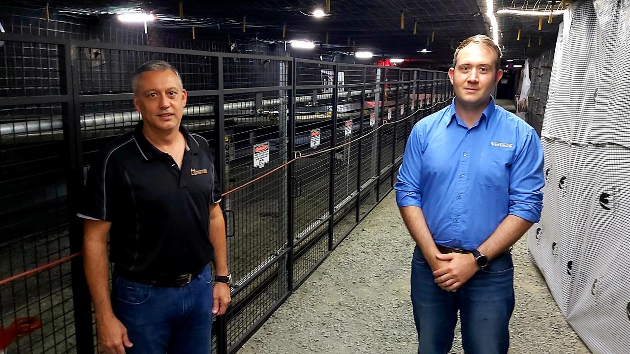 Resources Centre of Excellence CEO Steven Boxall (left) stands with Vayeron engineer and entrepreneur Ryan Norris, the first innovator in residence, by the replica conveyor system. Picture: Duncan Evans