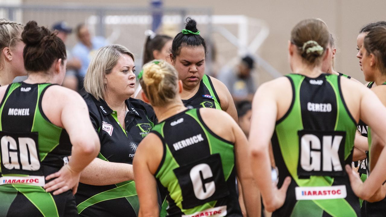 Darling Downs Panthers coach Camille Dowling talks to the squad during a break against Gold Coast Titans.