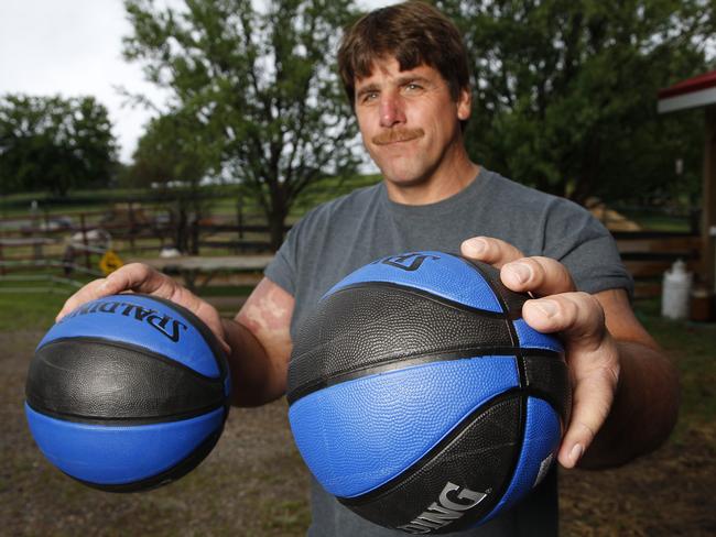 This strongman’s capable of holding a basketball in each hand. Picture: Caters News/Picture Media