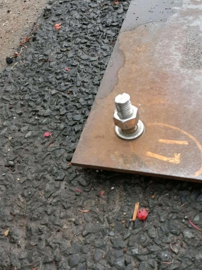 Protruding bolt on steel plate on street in Altona North. Pic: Snap Send Solve