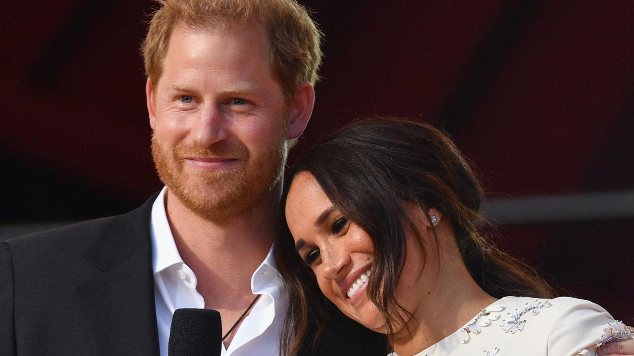 Meghan, seen here with husband Prince Harry, may score up to $3m from the win. Picture: Angela Weiss / AFP