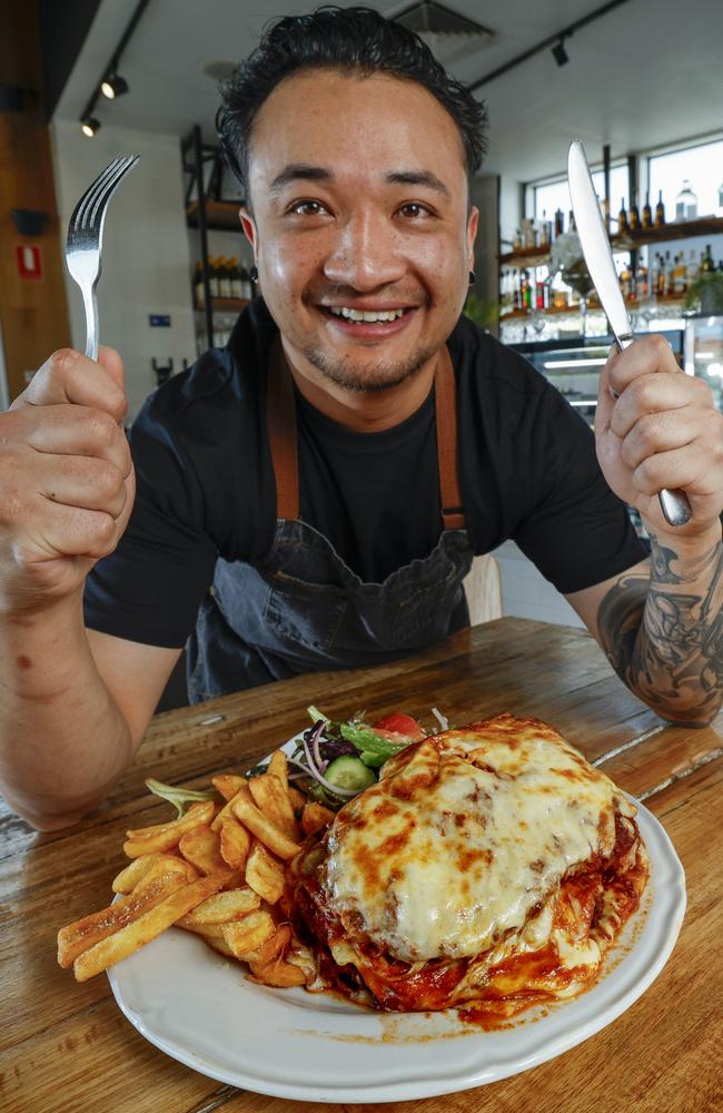 Fat Chef head chef Sanjay Rai with the restaurant’s 1+ kg parma. Picture: Michael Klein