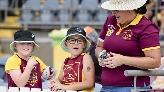 Harry, Lochlan (centre) and Gemma Johnson react watching the players at the Brisbane Broncos Captain's Run and Toowoomba Fan Day at Toowoomba Sports Ground, Saturday, February 15, 2025. Picture: Kevin Farmer