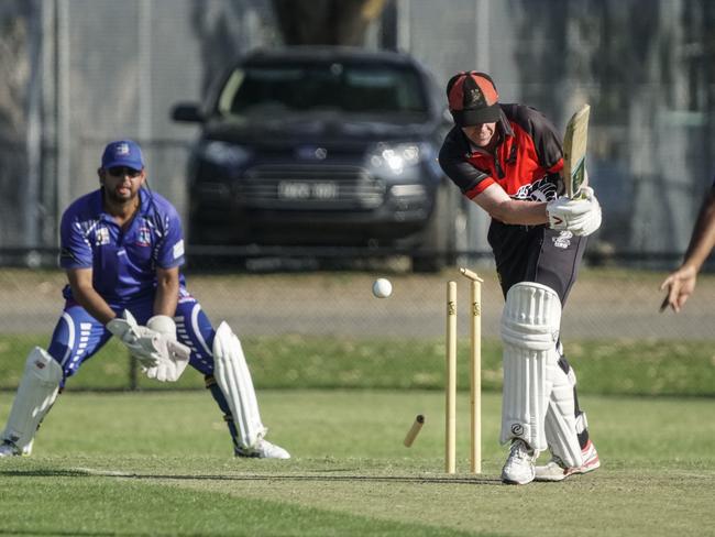 HSD batsman Glenn Hamilton loses his stumps. Picture: Valeriu Campan