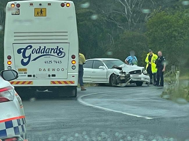 A school bus and car collided on Doolong South Rd in wet weather on Tuesday.