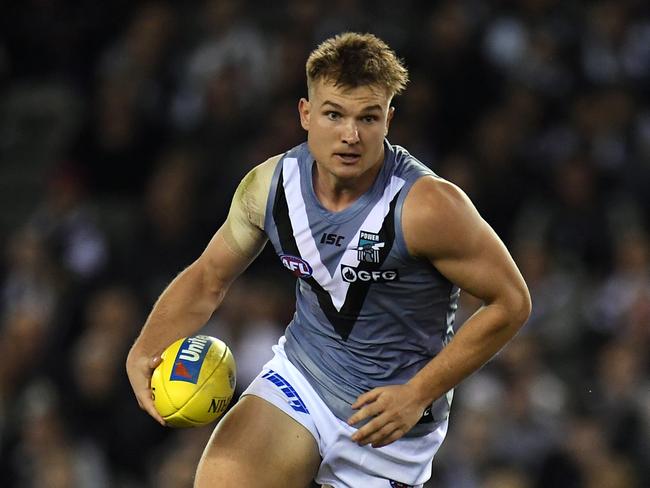 Ollie Wines of the Power is seen in action during the Round 7 AFL match between the Collingwood Magpies and the Port Adelaide Power at Marvel Stadium. Picture: AAP Image/Julian Smith