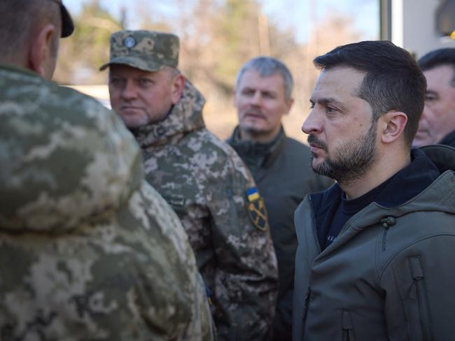 Ukraine's President Volodymyr Zelenskyy and former Commander-in-Chief of the Ukrainian Armed Forces Valery Zaluzhny, second left, visit a training centre. Picture: AFP