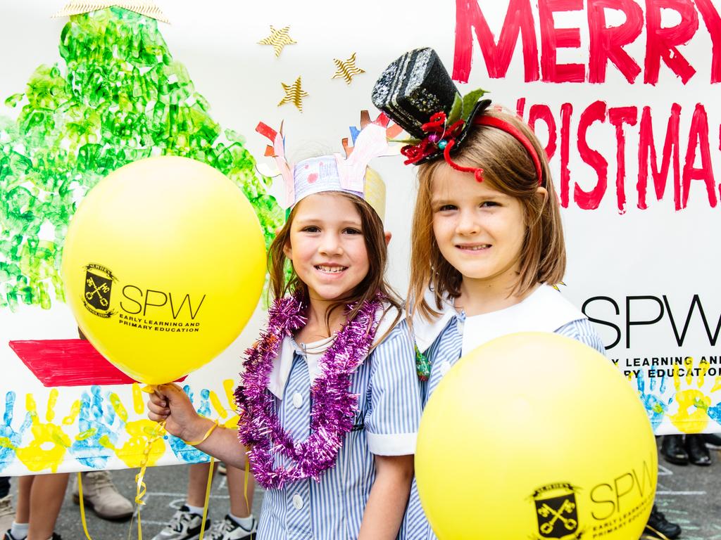 Lucy Pisanelli and Baylee Hanna at the Glenelg Christmas Pageant. Picture: Helen Page